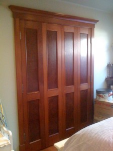 Mahogany bi-fold closet doors   